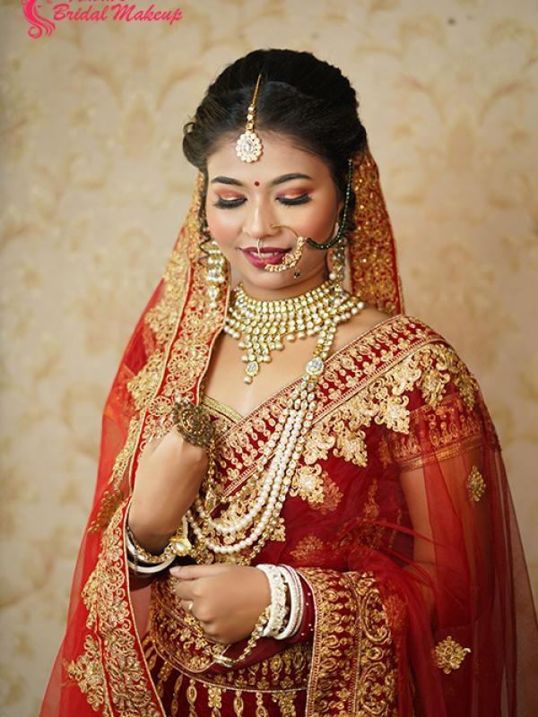 A Portrait of a Bridal Woman Wearing Her Traditional Lehenga Wedding Dress  · Free Stock Photo